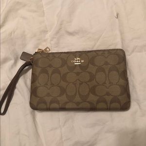 Coach light brown wristlet/clutch